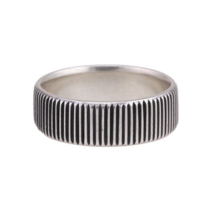 Front-facing view of Sterling Silver Coin Edge Band by Stephen Dove.