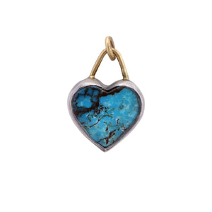 Front-facing view of 46 Gem Heart Charm with Turquoise by Edna Madera.
