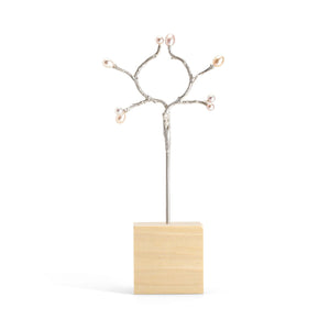 
            
                Load image into Gallery viewer, Silver double hair stick w/pink pearl plums by Betsy Barron, in wood block display.
            
        