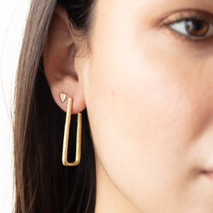 
            
                Load image into Gallery viewer, Model wearing Tallboy Hoop by Betsy Barron Jewellery in right ear
            
        